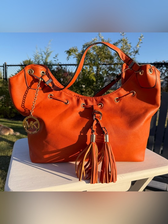 Michael Kors Handbags - Michael Kors Bright Orange Leather Shoulder Bag with Tassels